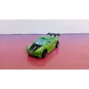 2007 Hot Wheels Design 3/4 Green Asphalt Assault 1/64 Collector #47